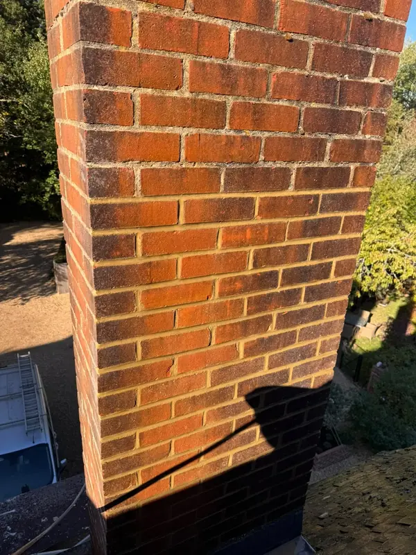 Brick chimney with fresh pointing