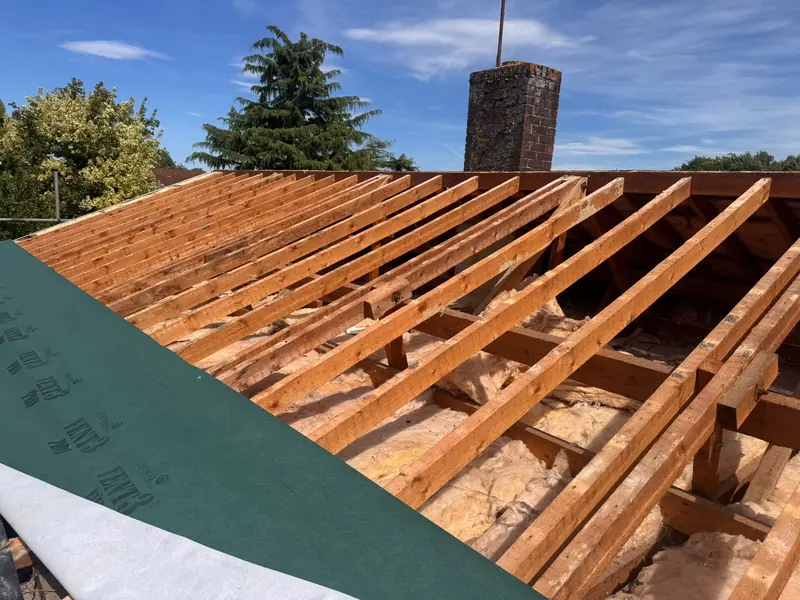 Roof stripped back to new timber battens and membrane